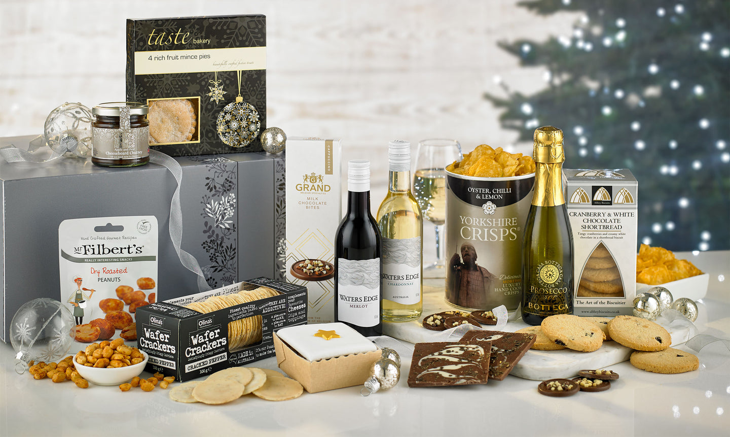 A Wine & Prosecco gift box from Spicers of Hythe, a perfect luxury gift box for corporate customers & staff. Featuring wines, chocolates, cakes & more.